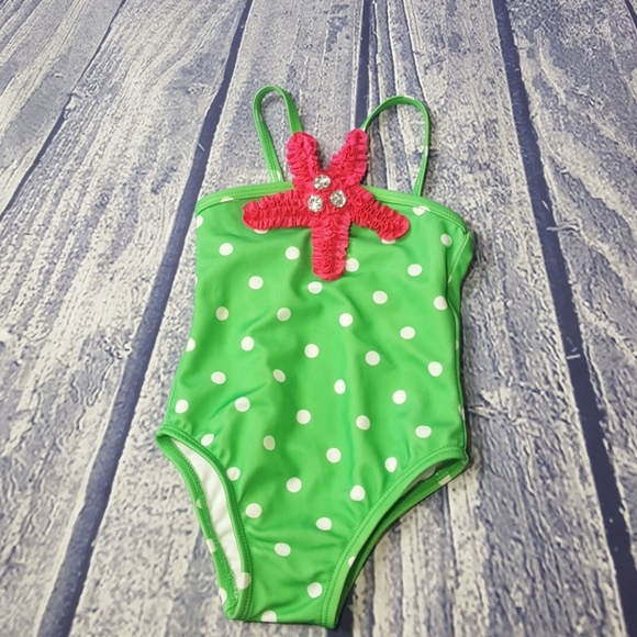 baby in starfish suit